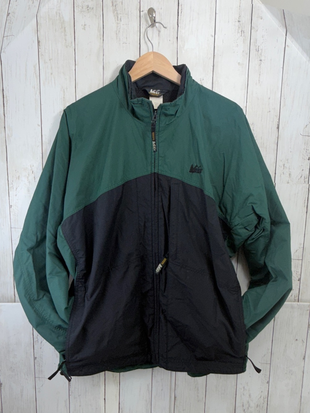 Vintage REI Co-op colorblock nylon  windbreaker jacket in green and black.
Med.